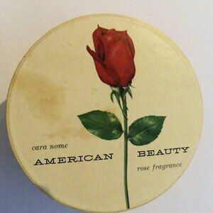 American Beauty Dusting Powder by Cara Nome. New, unopened 5.5oz in sealed box